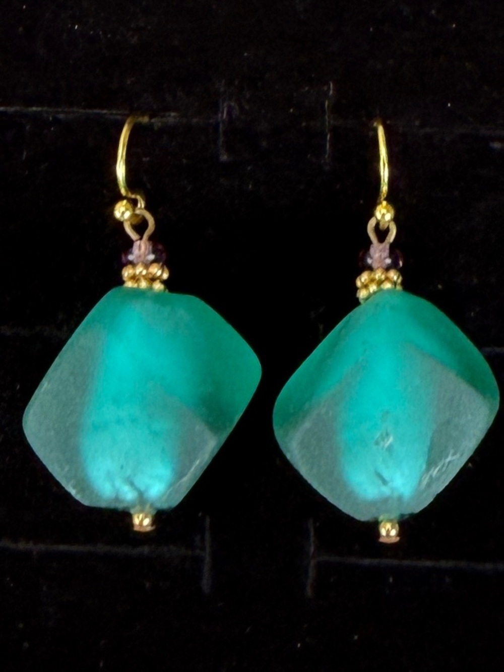 Pretty goldtone, large greenish bead costume pierced earrings